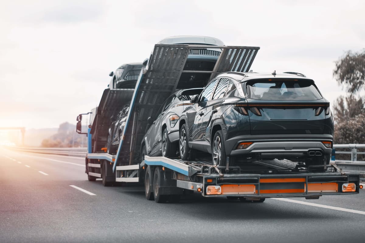 Car carrier truck transporting multiple vehicles across the country
