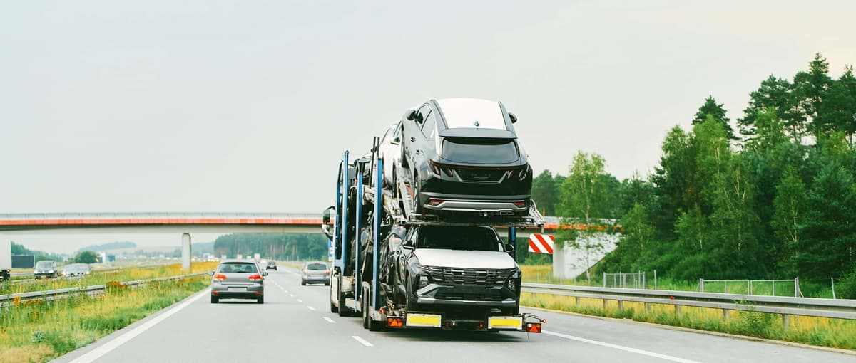 Car carrier truck transporting multiple vehicles across the country