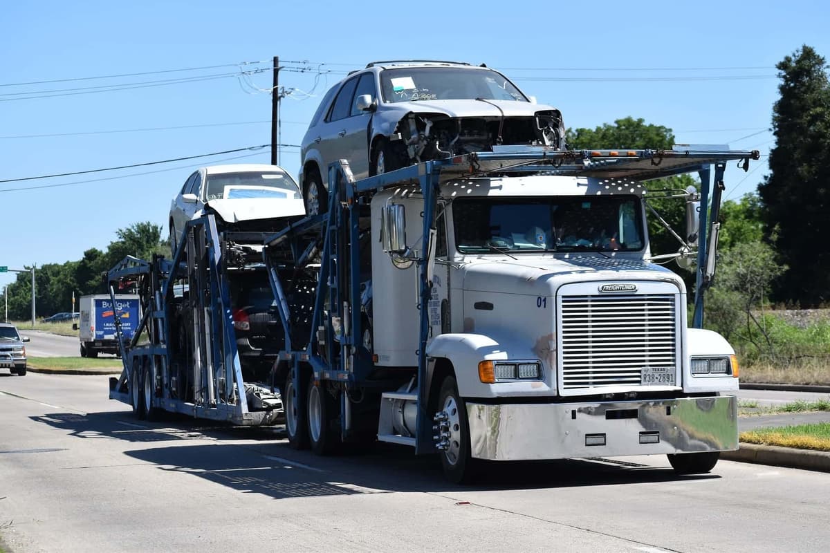Car carrier truck transporting multiple vehicles across the country